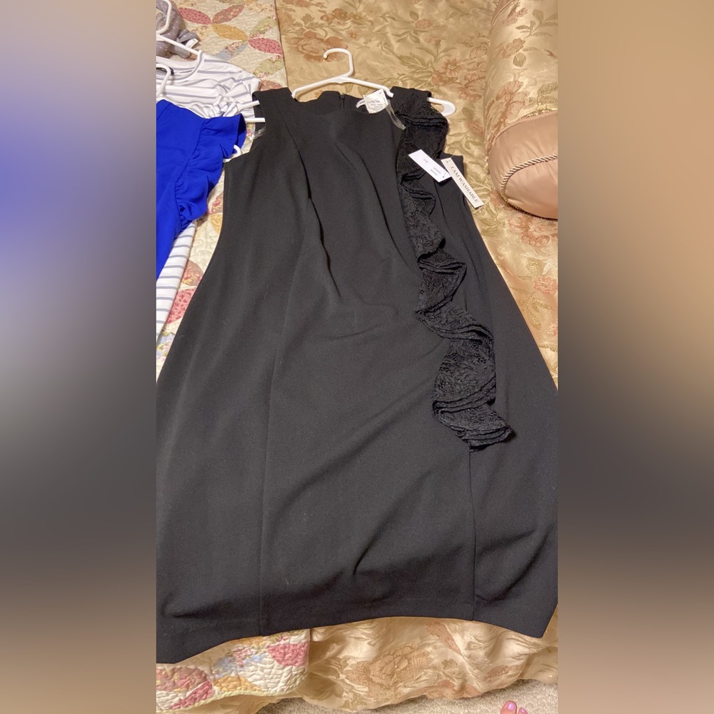 Funeral dress never worn